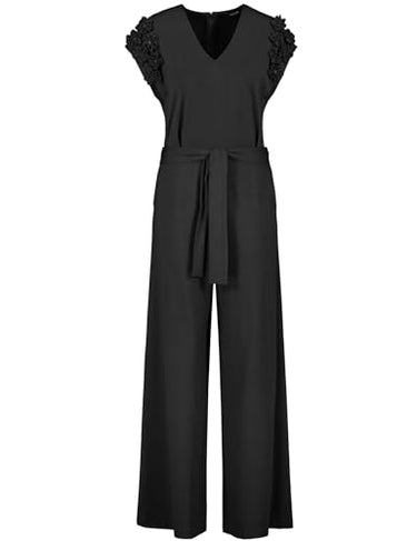 Taifun Damen Eleganter Jumpsuit mit Chiffon-Blumen überschnittene Schultern, Kurzarm unifarben lang Schwarz 34 im Sale